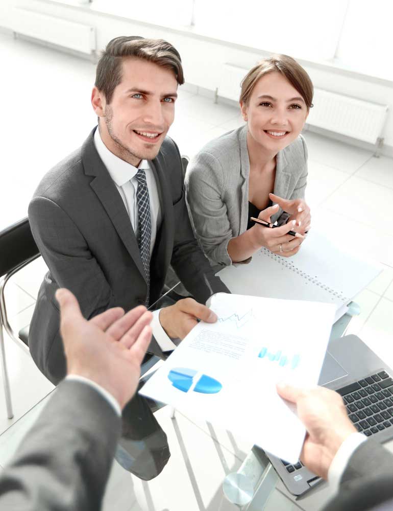 cpa-3 Business professionals reviewing financial charts during a client consultation, delivering trusted cpa boca raton accounting services